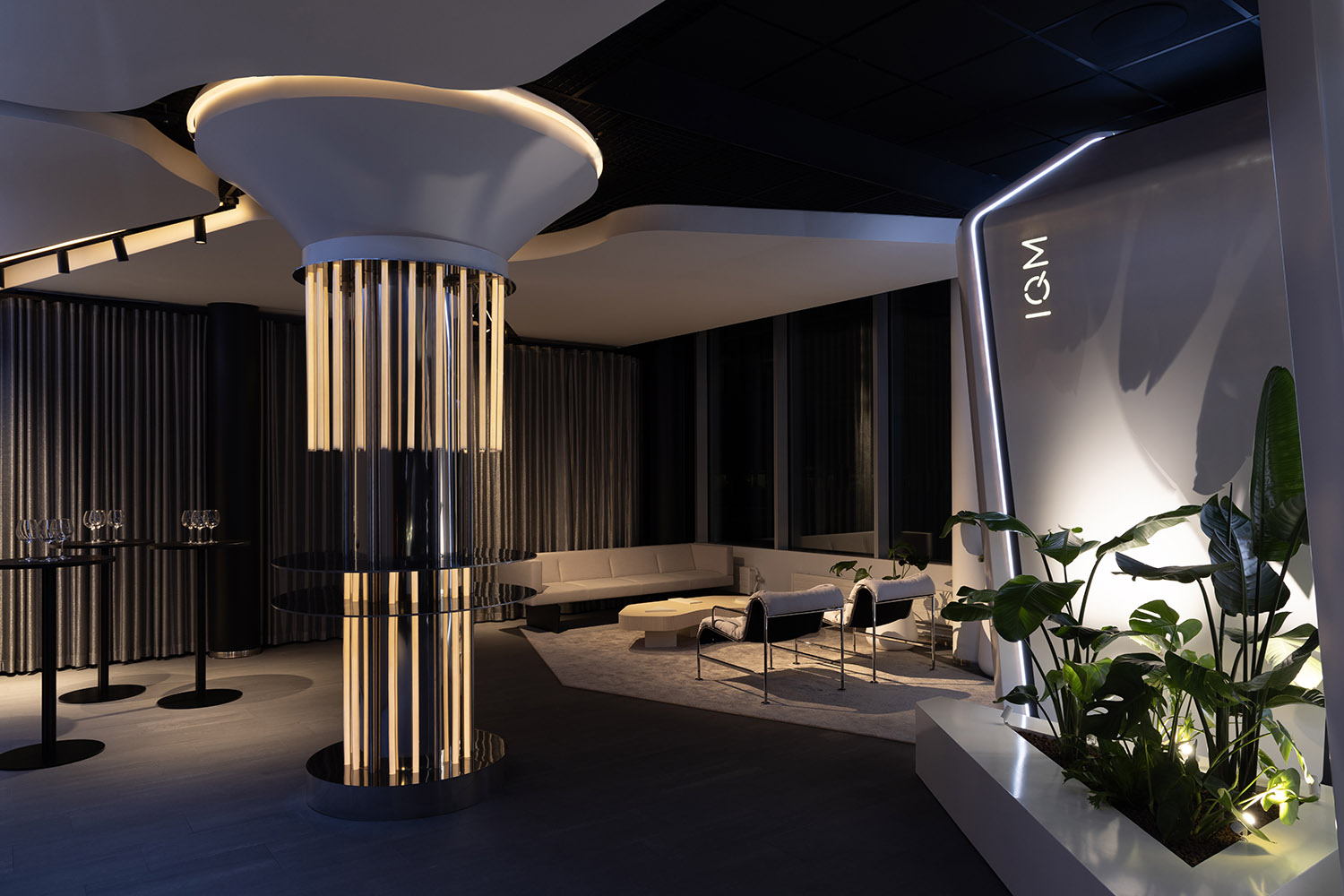 IQM quantum computer showroom design lounge area evening event space