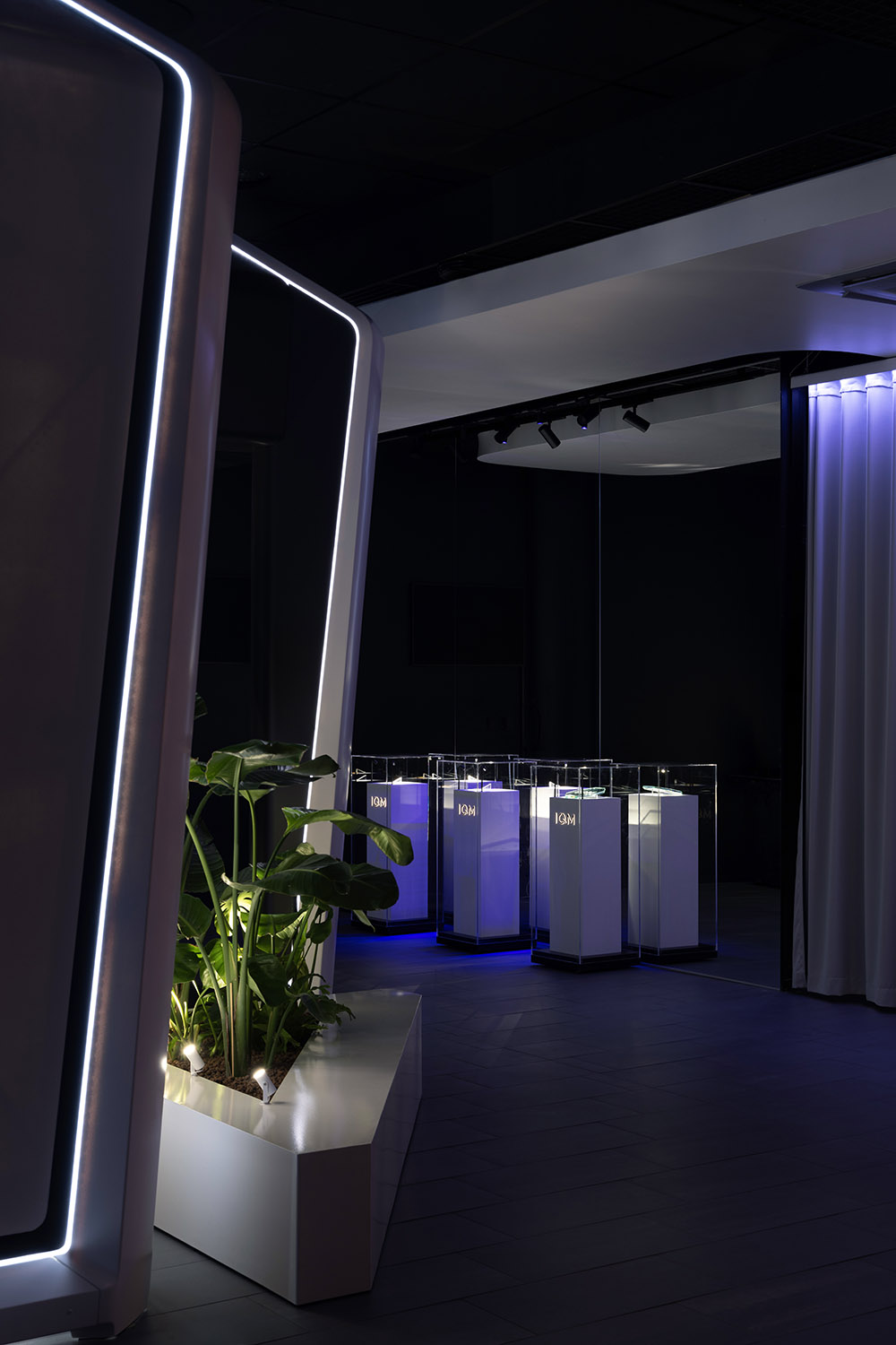 IQM quantum computer showroom design models plants museum podiums lighting