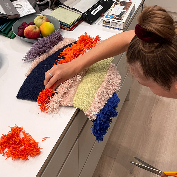  Podimo studio & office design behind the scenes custom tufted wall piece rug