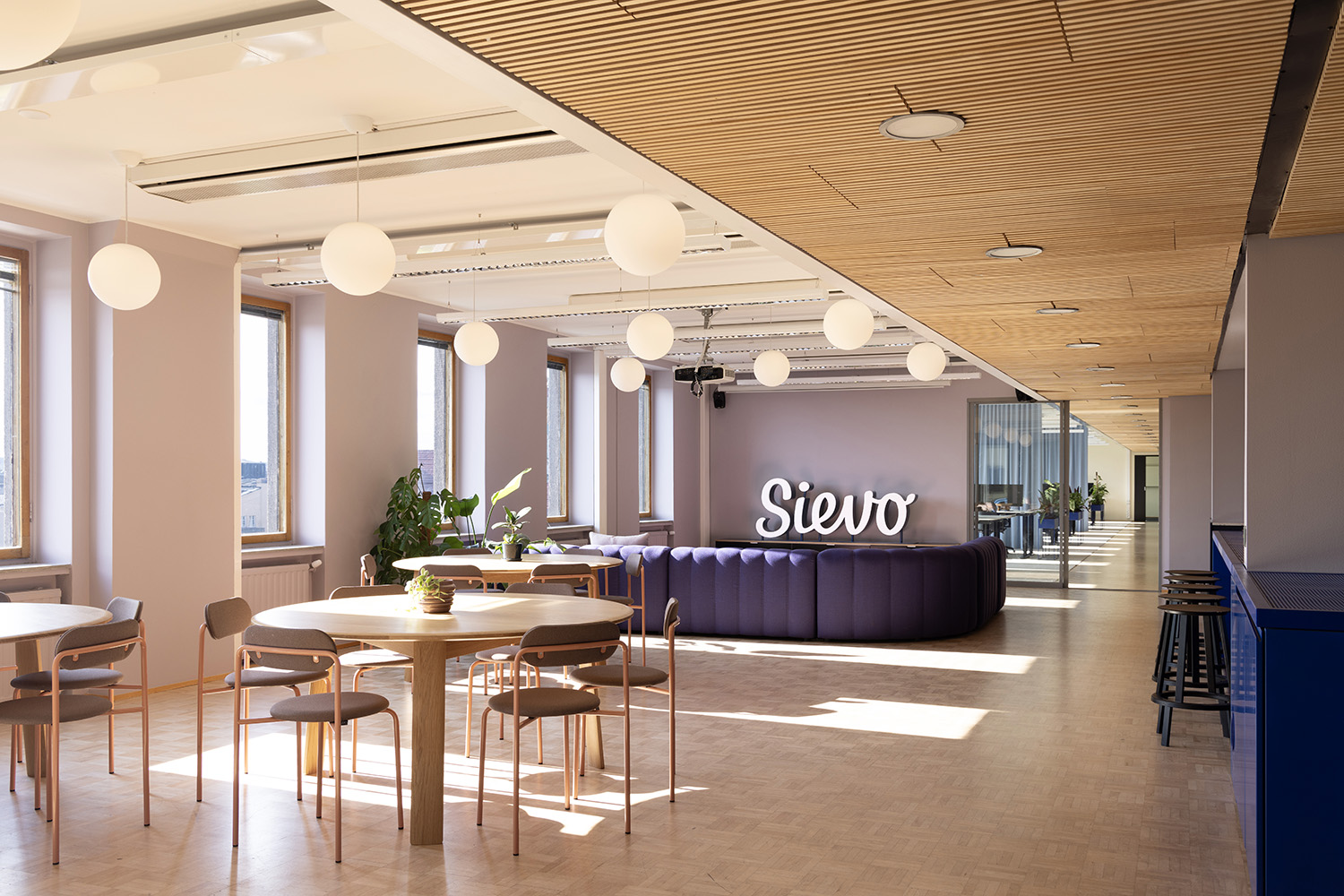 Sievo office design community lounge