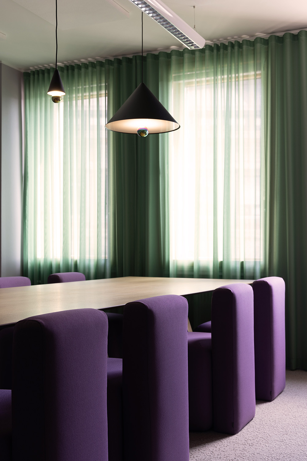 Sievo office design meeting room green purple Magic