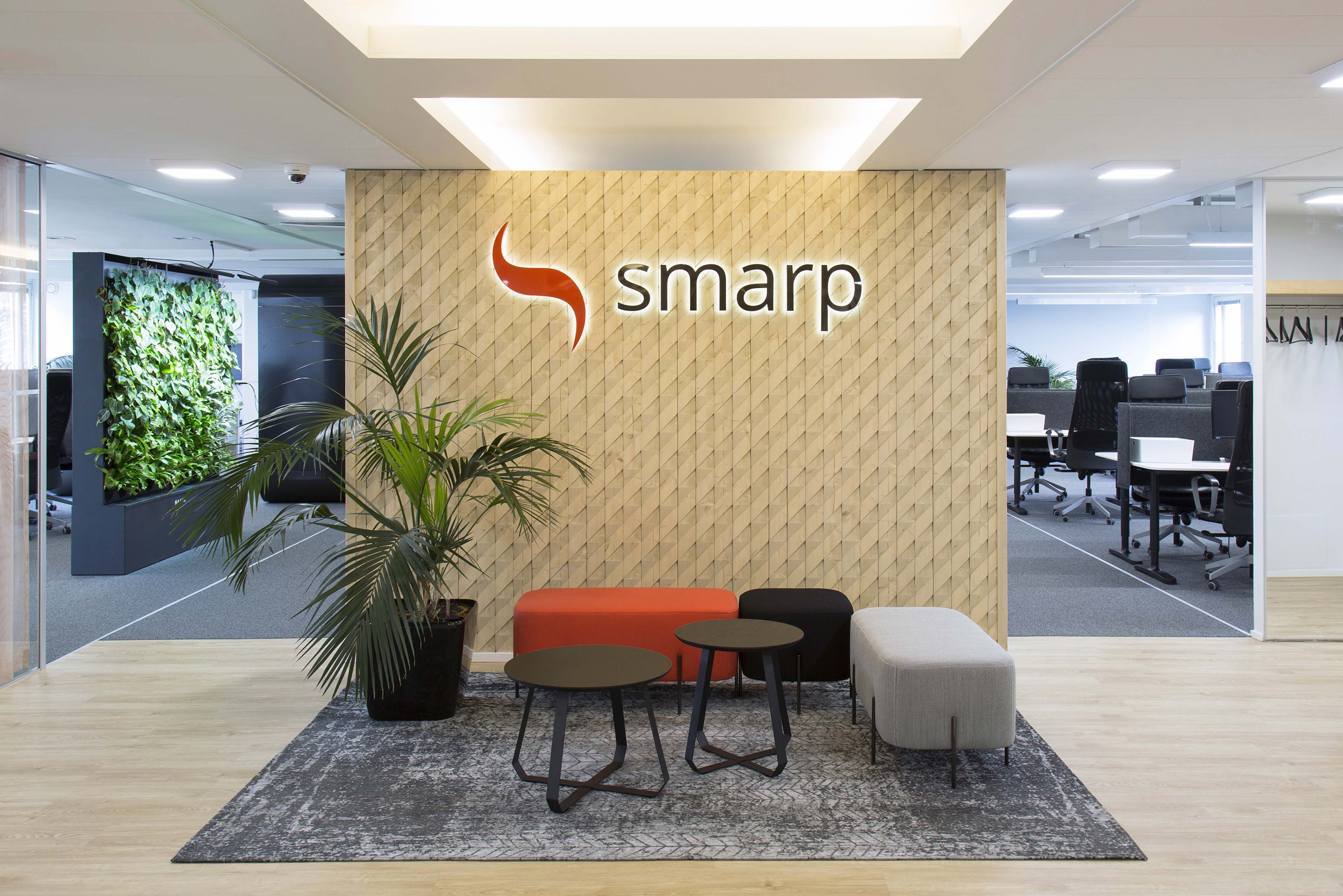 Smarp office entrance lounge logo