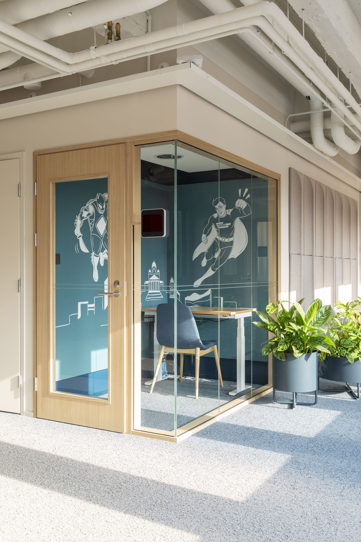 Supermetrics office phone booth custom superhero