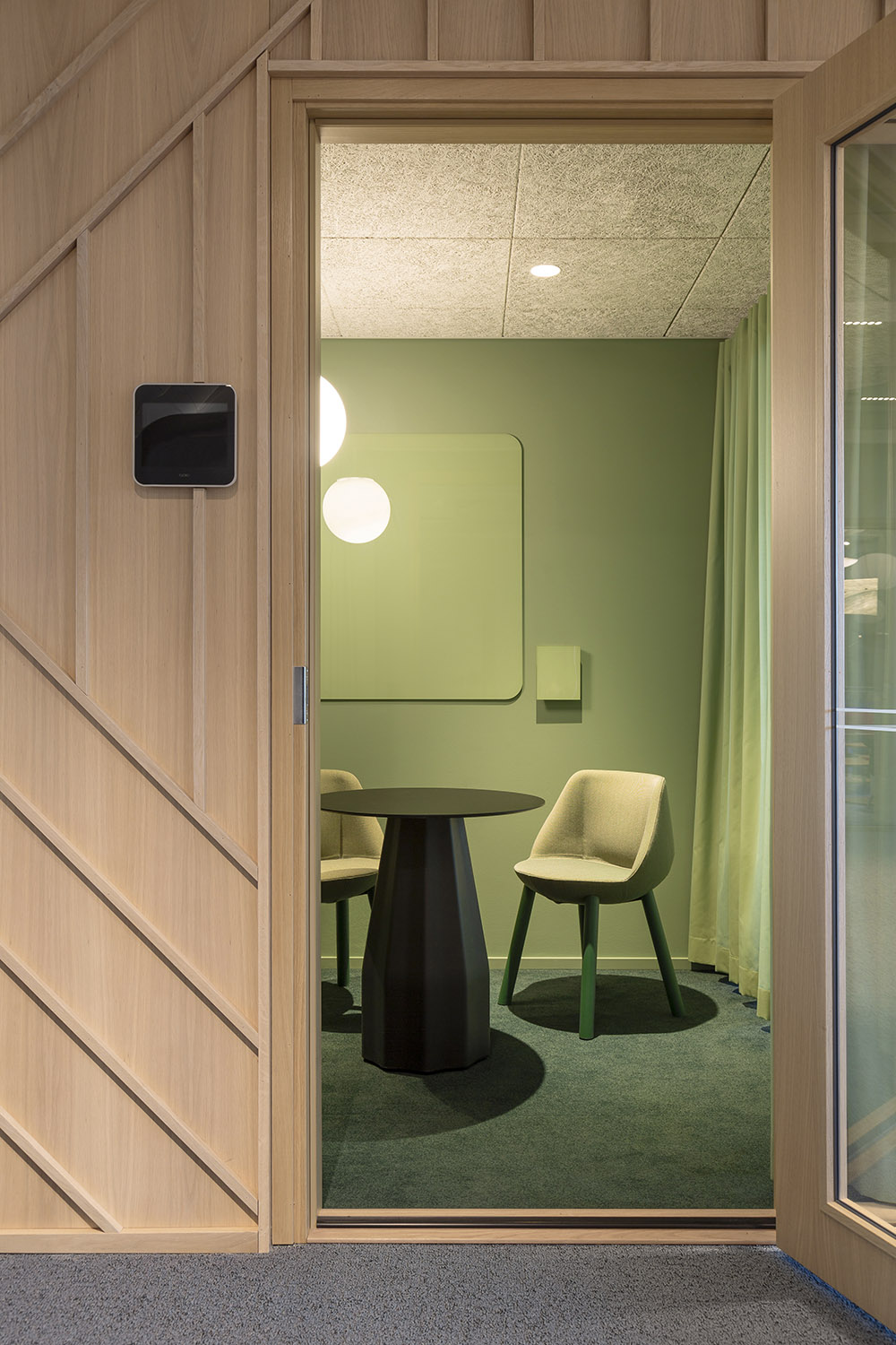 Supermetrics office design meeting room green