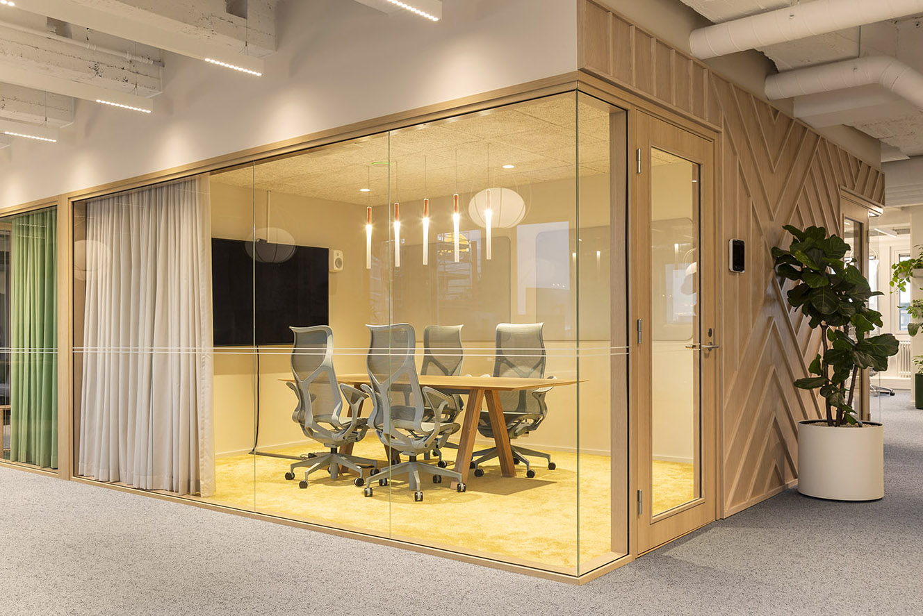 Supermetrics office design open workspace meeting room yellow