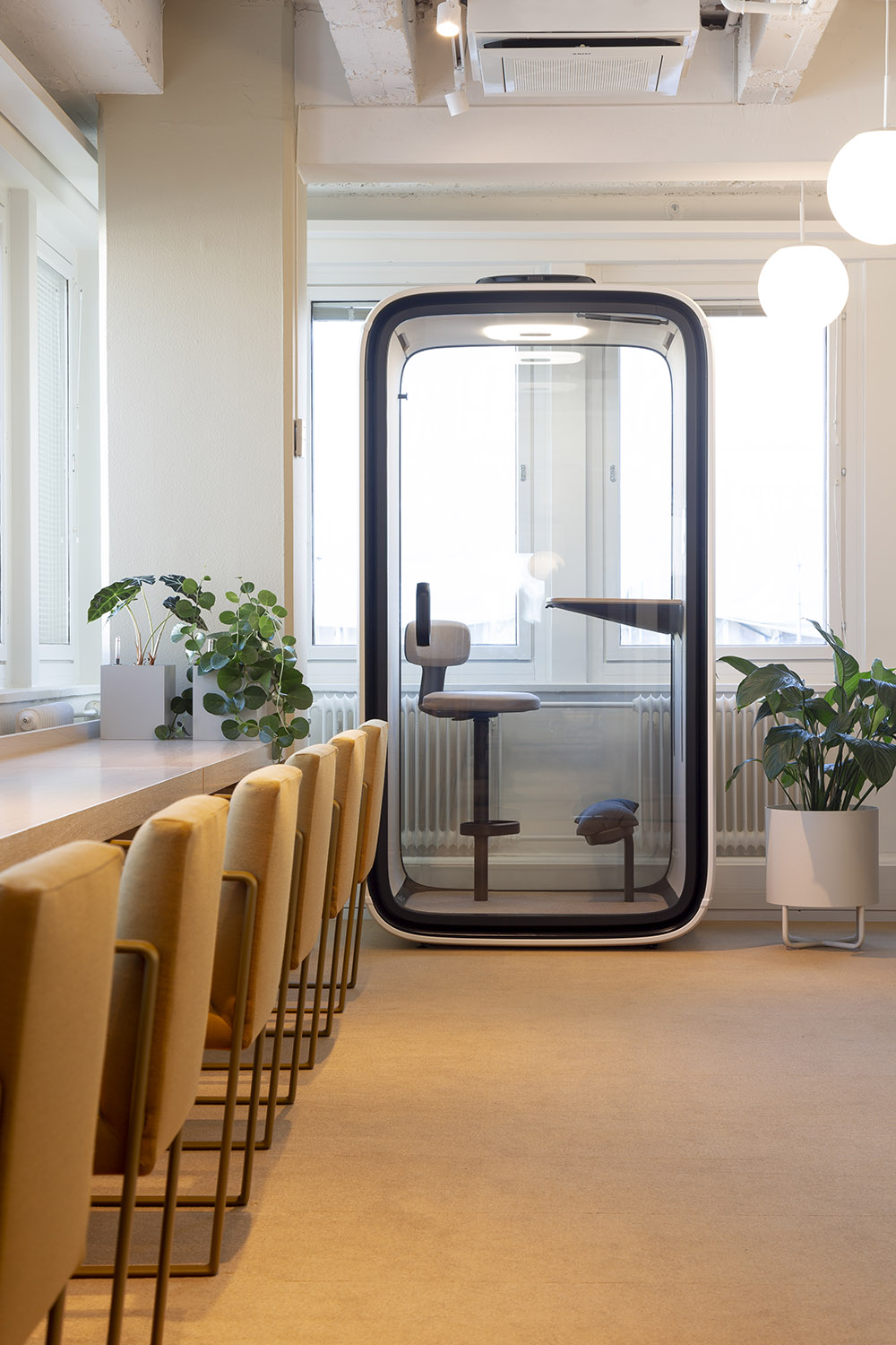 Supermetrics office design quiet workspace yellow