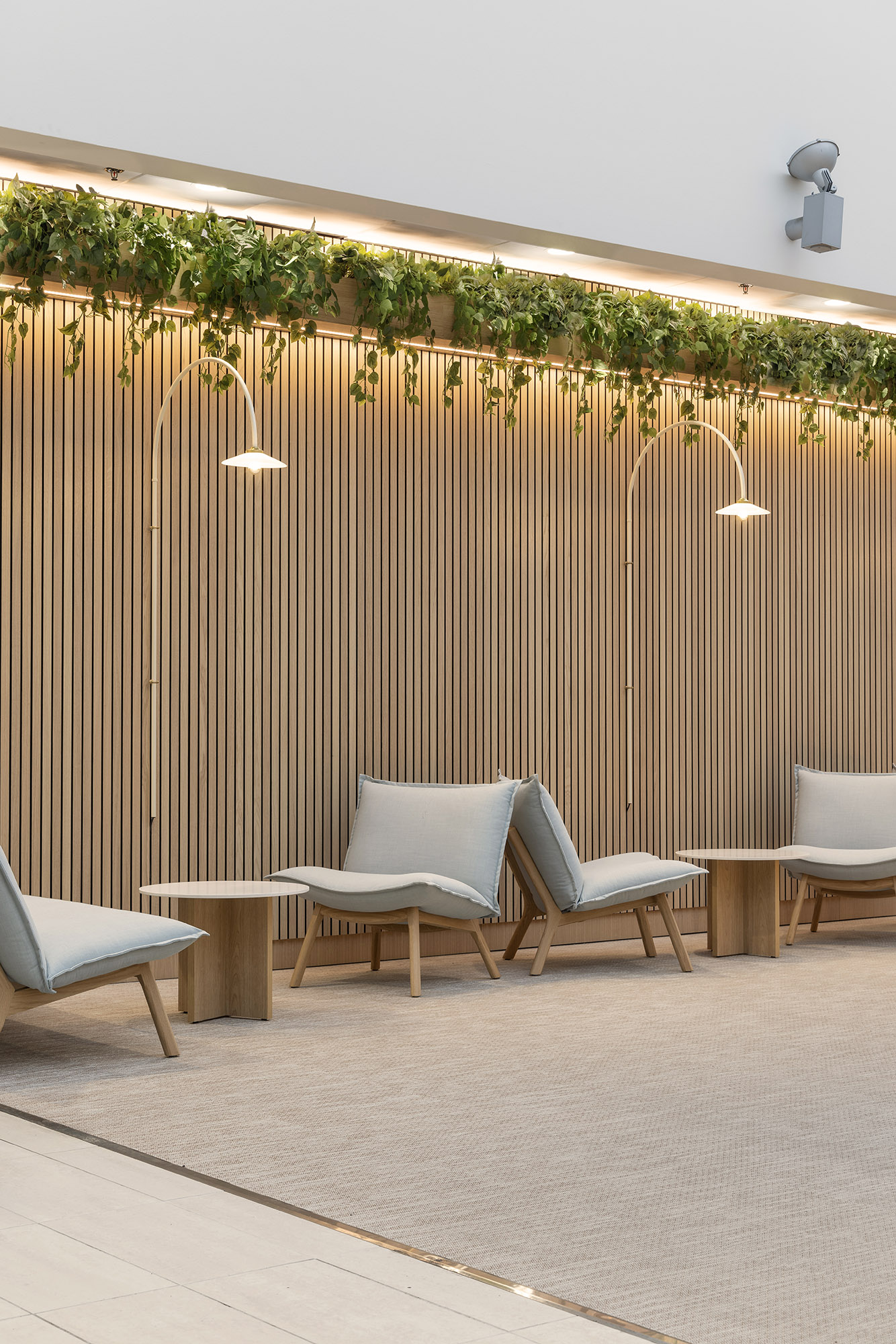 Terveystalo Kamppi hospital design lobby waiting area lounge sofas