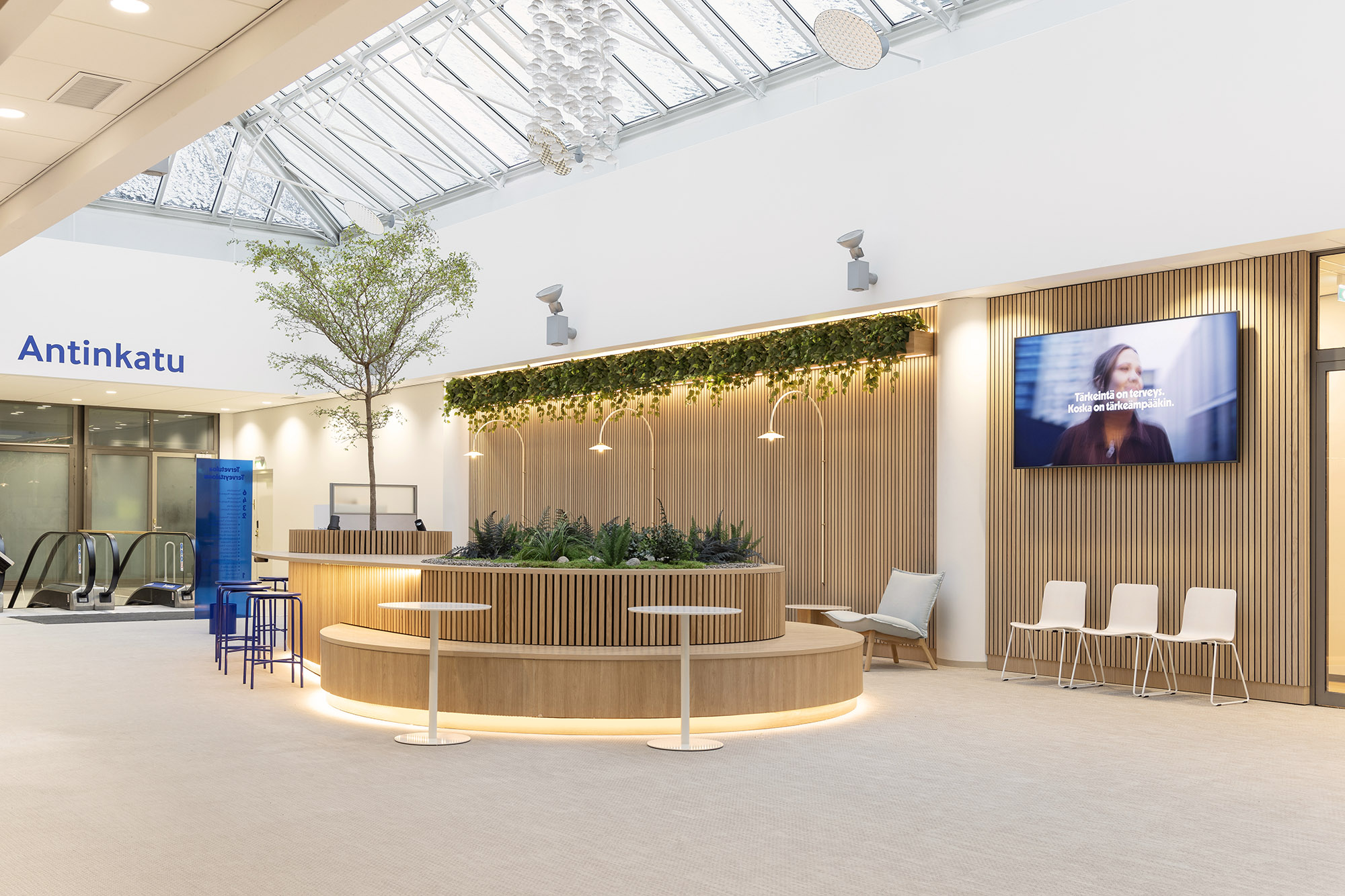 Terveystalo Kamppi hospital design lobby reception lounge