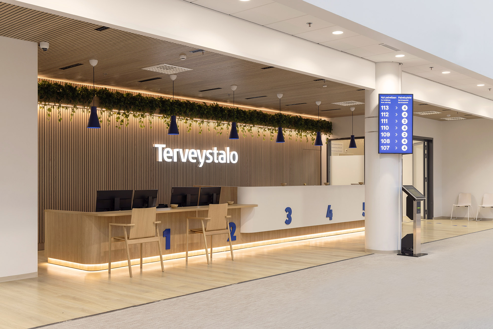 Terveystalo Kamppi hospital design lobby reception customer service