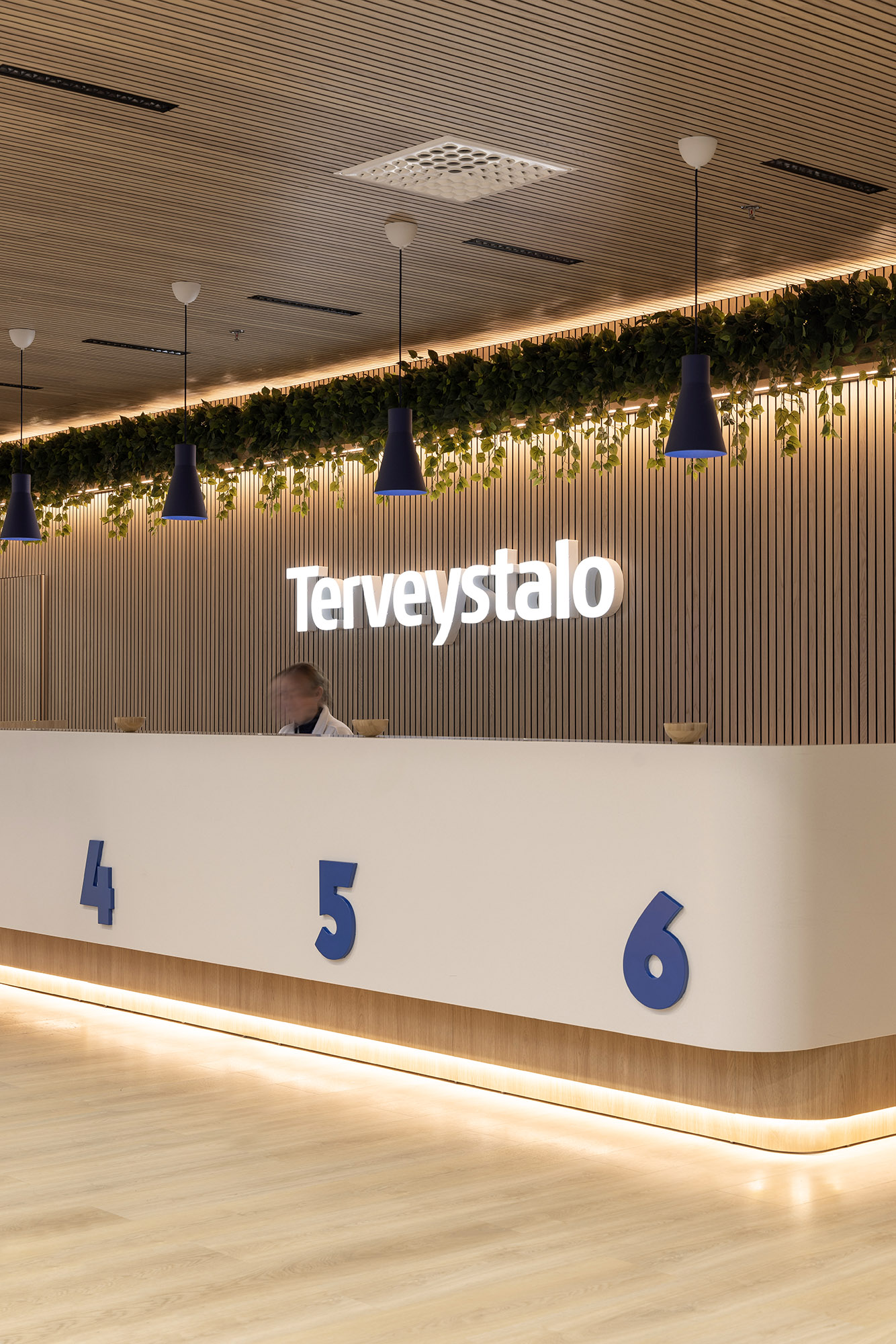 Terveystalo Kamppi hospital design lobby reception desk