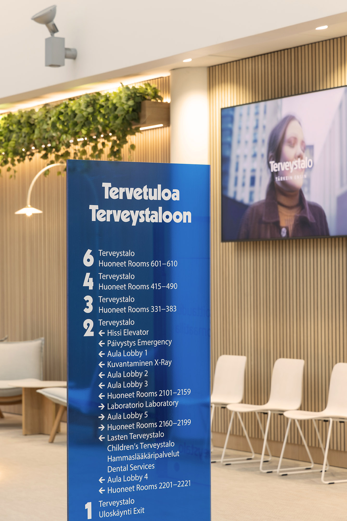 Terveystalo Kamppi hospital design lobby reception signage